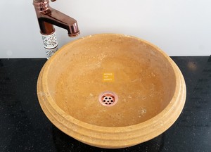 Fregadero de travertino amarillo