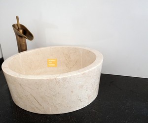 Lavabo con rodillo de mármol beige