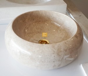 Lavabo en marbre beige